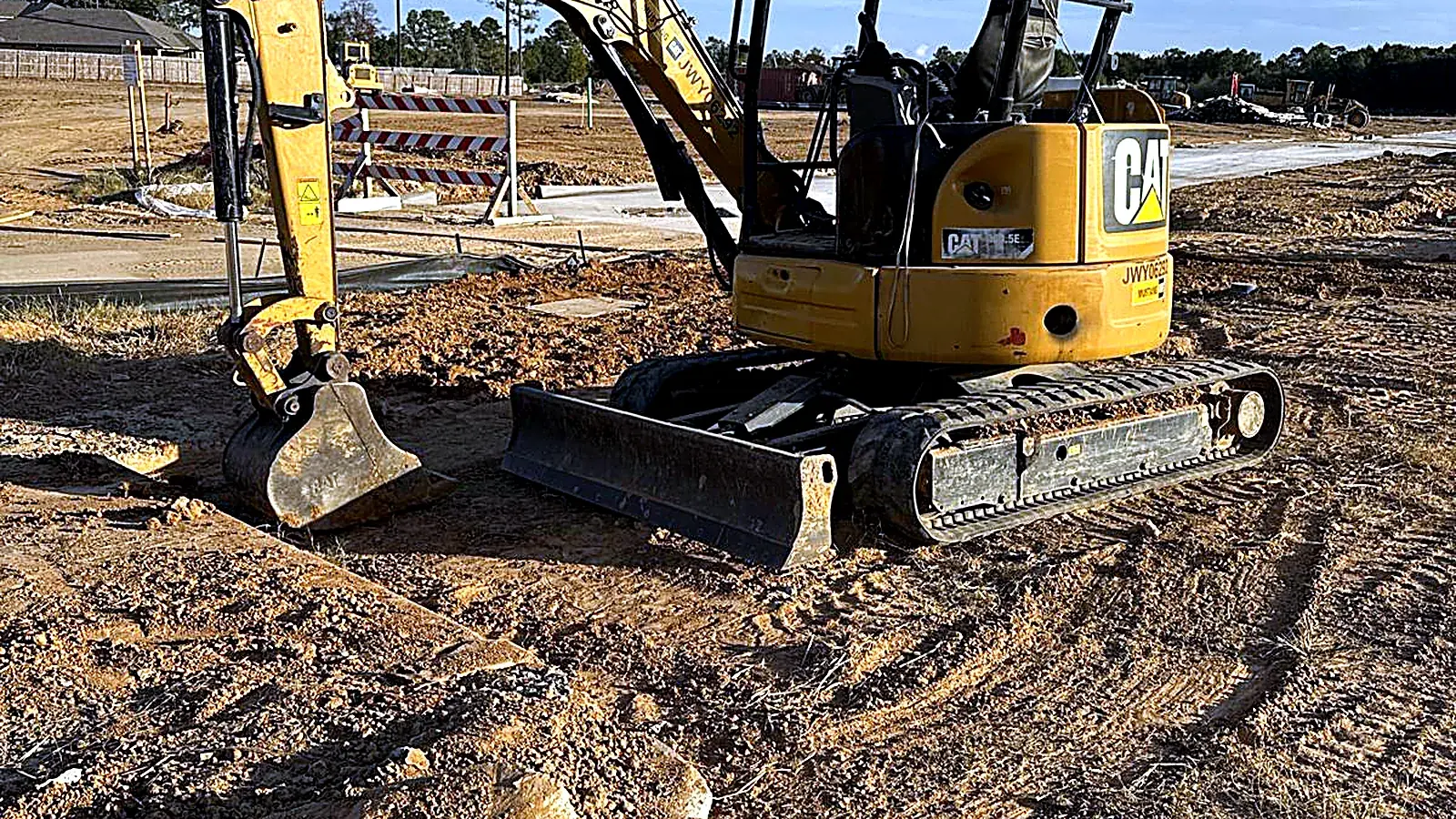 IST mini excavator on a fiber build